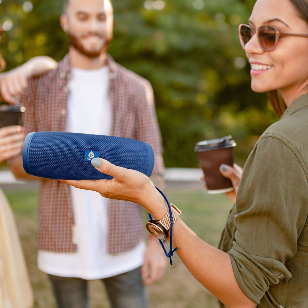 Wireless Pursonic Power Player speaker with sleek black design and control buttons on the top.