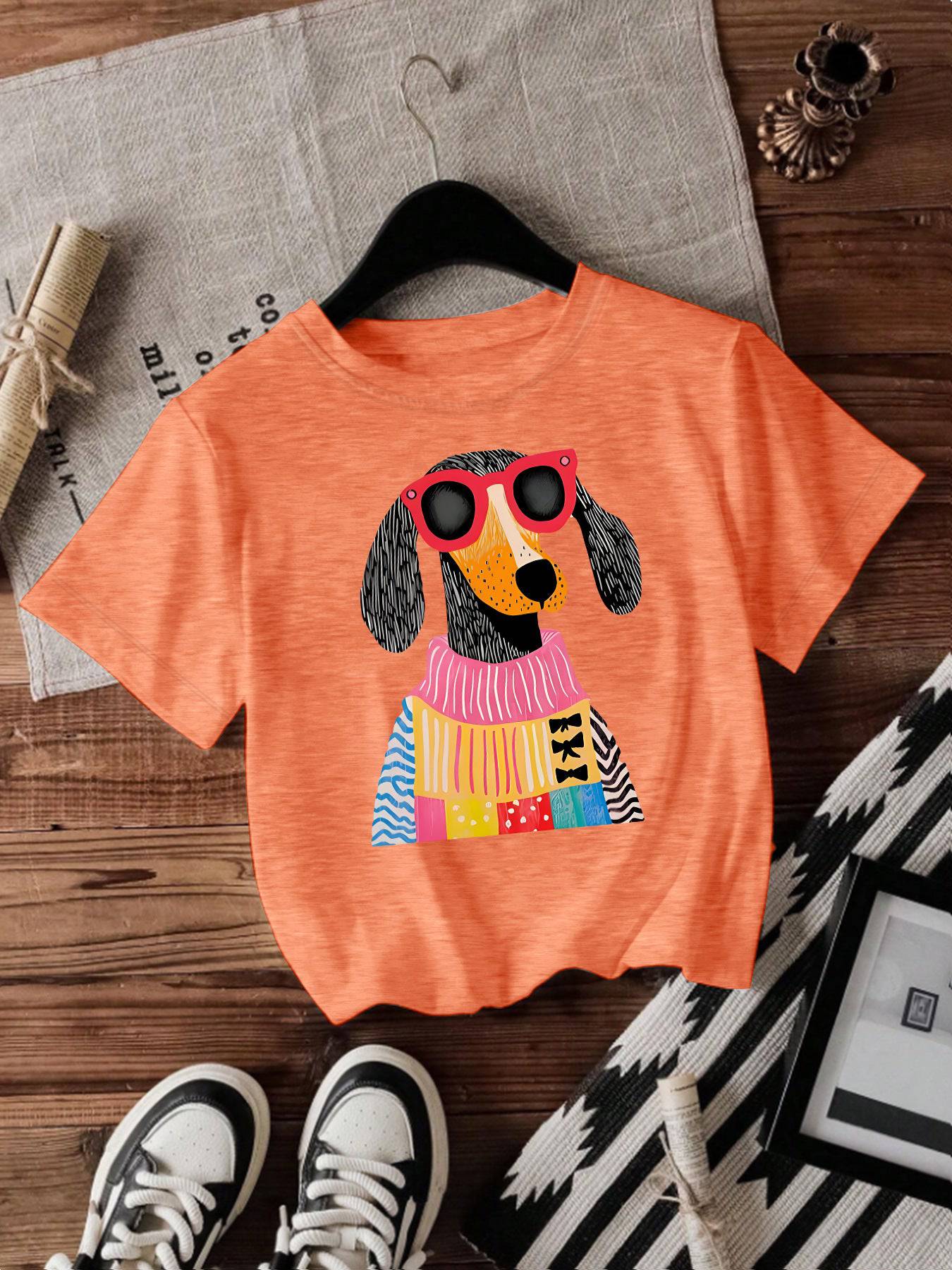 Eprolo women's short-sleeved dog print T-shirt showing a casual fit and colorful dog graphic design.
