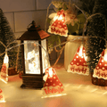 Colorful Christmas hats, festive Christmas lights, and LED string lights from eprolo arranged for holiday decoration.