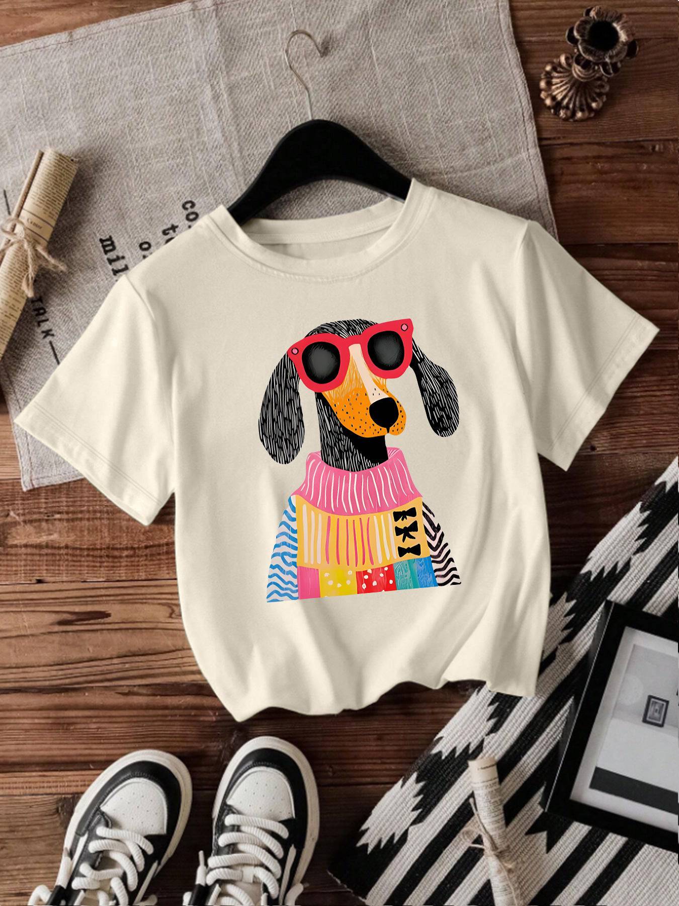 Eprolo women's short-sleeved dog-themed T-shirt with a casual fit, featuring a playful graphic design, on a white background.
