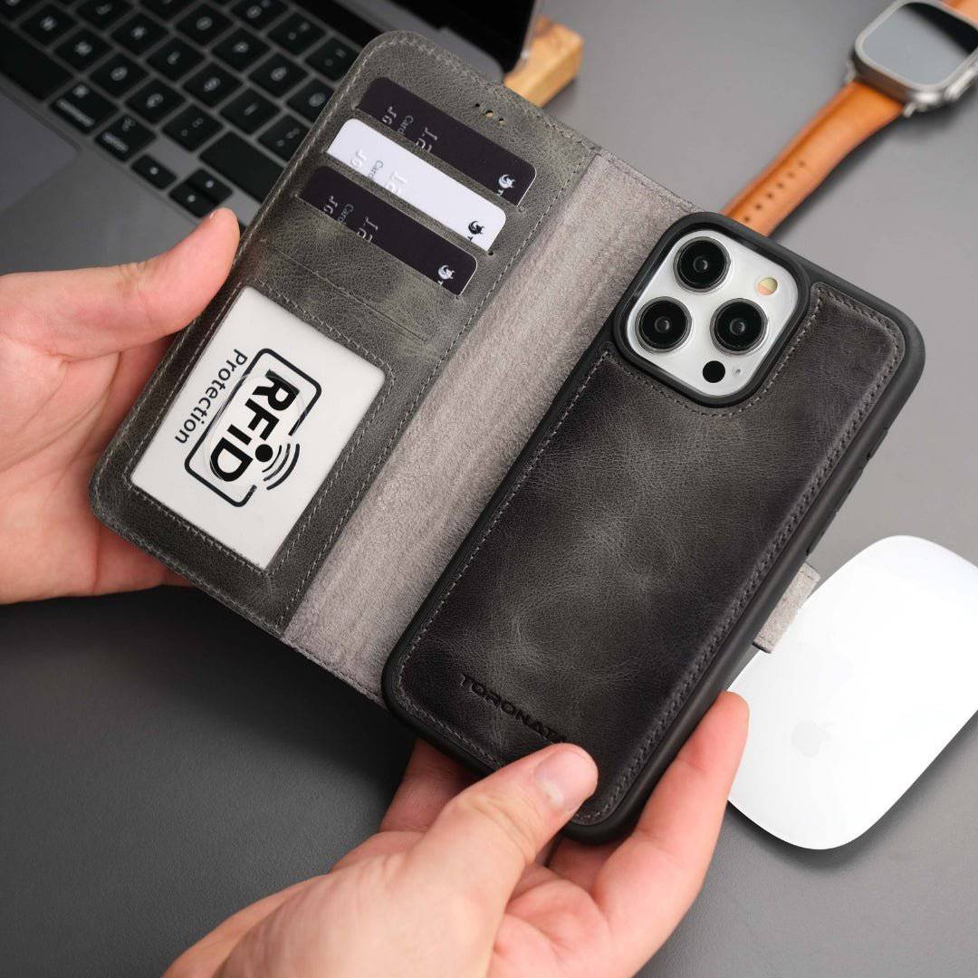 TORONATA Casper leather wallet case for iPhone 16 Pro Max with MagSafe, in grey, featuring card slots and secure phone protection.